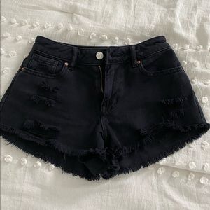 PacSun Ripped Black High Waisted Festival Shorts.